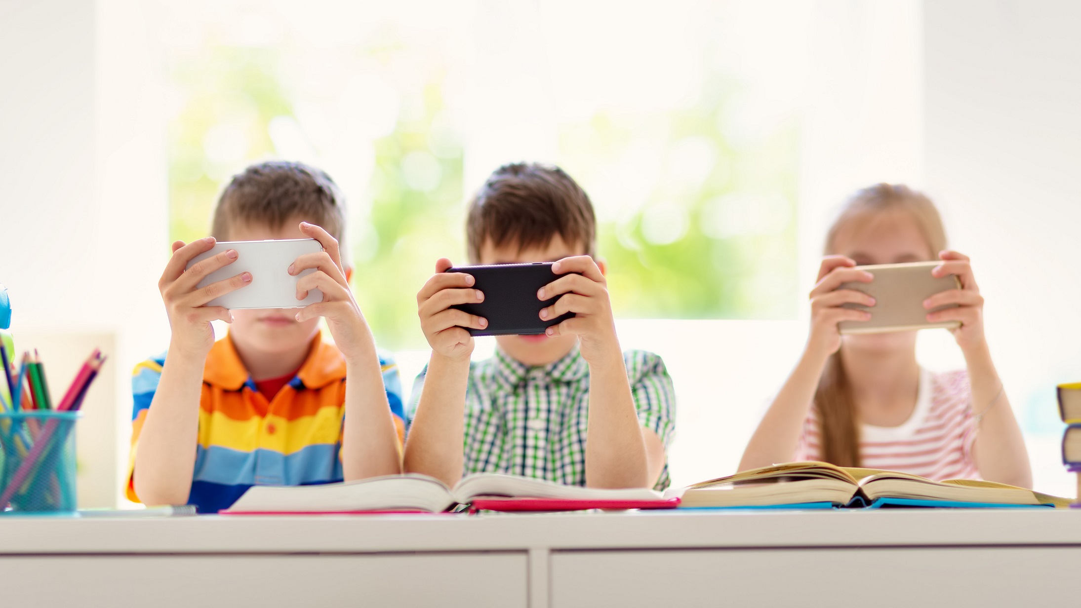 Should phones be allowed in schools? Information Age ACS